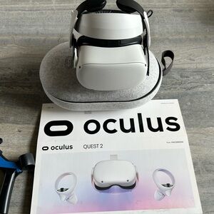 Oculus Quest 2 with carrying case and ping pong paddle